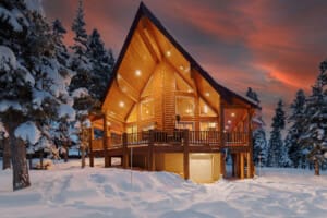Cozy mountain cabin rental in Duck Creek Village, Utah, covered in fresh winter snow near Zion National Park